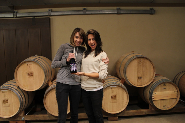 me and Autostraddle.com co-founder Alexandra Vega with a bottle of wine