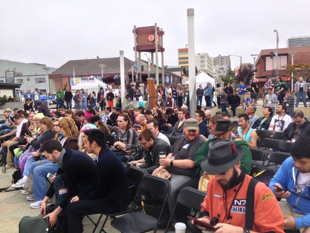 An eager crowd awaits the opening ceremonies.