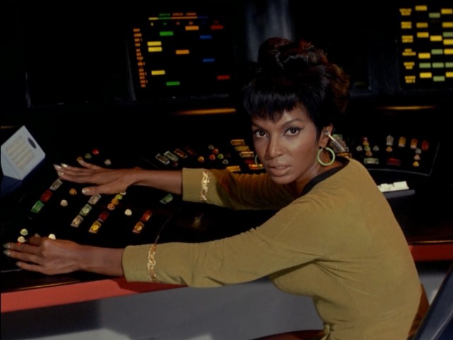 Check out those earrings! And that Bluetooth headset! Uhura's always stylin'.