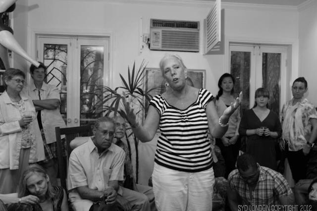 Hollibaugh speaks at a QEJ gathering. via Syd London and QEJ Facebook