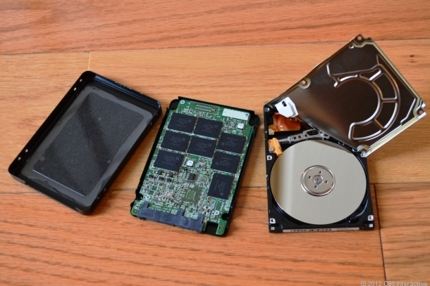 Inside an SSD (left) and spinning hard drive (right).