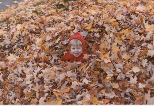 Riese in a pile of leaves circa 1984