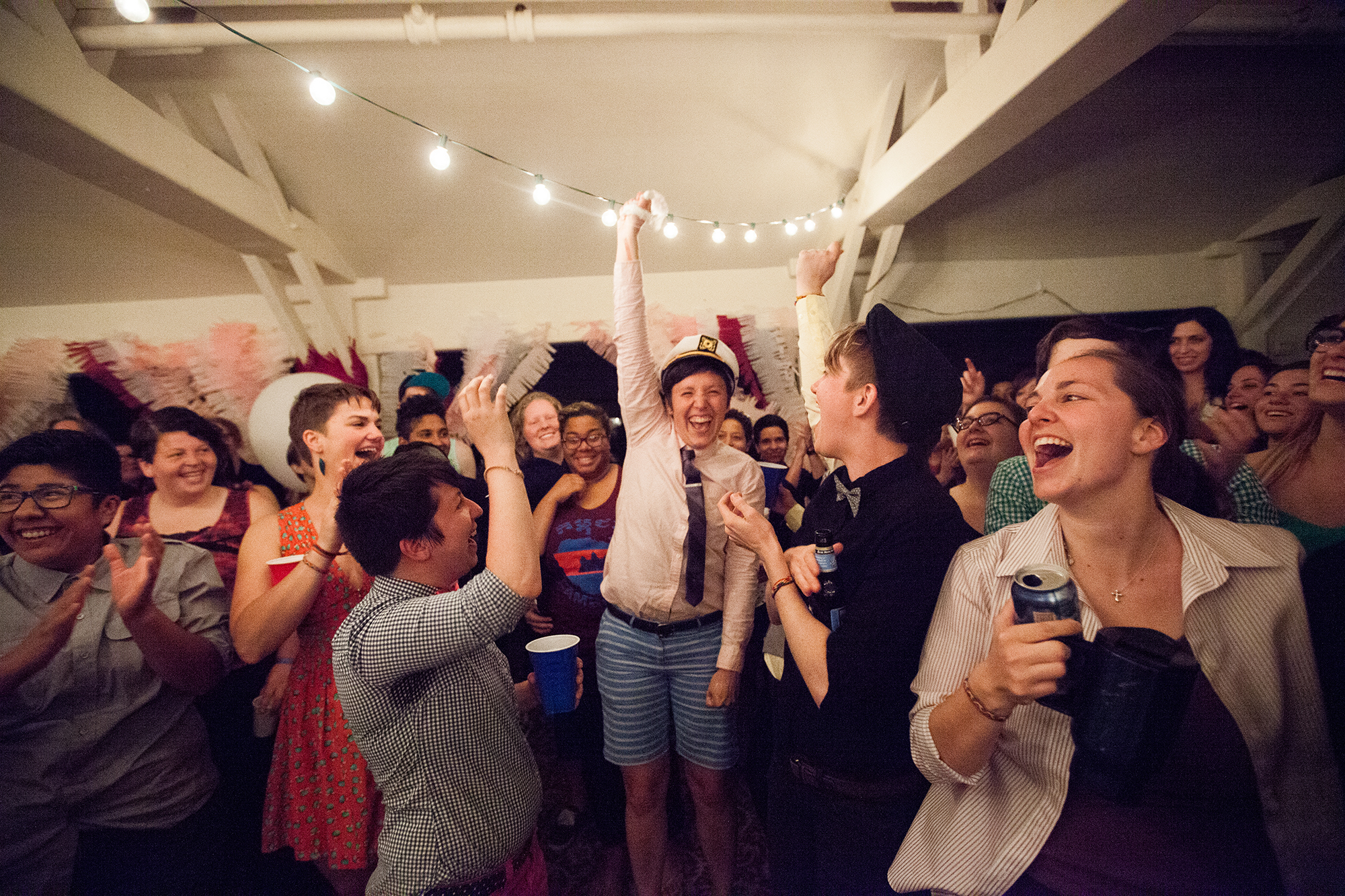Catching the Garter at A-Camp 5.0's Big Gay Wedding (photo by Robin Roemer)