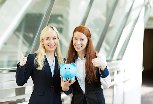 two women piggy bank