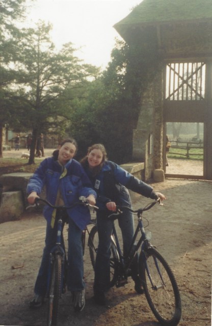 Laura and Kate riding bikes. We took Kate with us on our family vacation. Versailles, 2001.