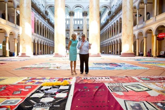 Julie Rhoad and Jill Biden view part of the AIDS Quilt. Via whitehouse.gov