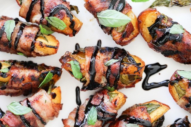 Of all the foods one could wrap in a smoky blanket of bacon, how id I not think of this before this foodie blog did?