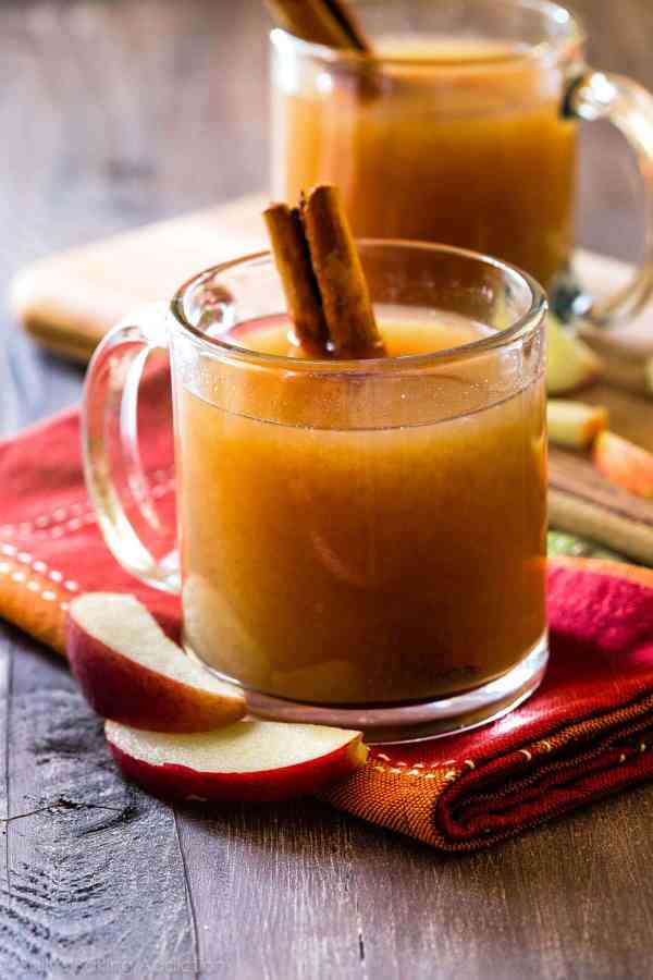 a clear mug of apple cider