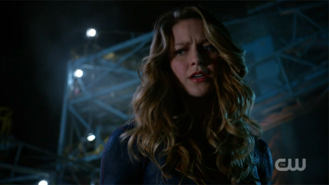 Kara glares down at Cyborg Superman