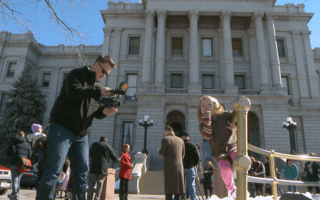 Coy Mathis being filmed outside the courthouse.