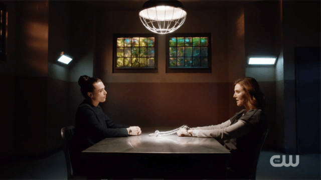 Lena and Lillian sit across the table from one another, not unlike they're playing chess