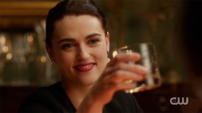Lena toasts with whiskey