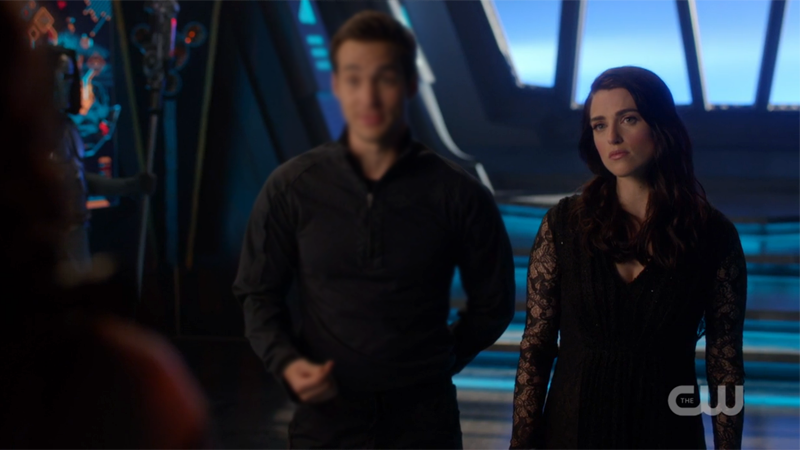 Lena looks SO DONE with this whole situation; there is a blurry form beside her