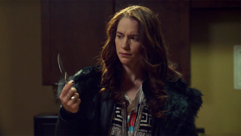 Wynonna looks at Waverly's stolen knife, perplexed