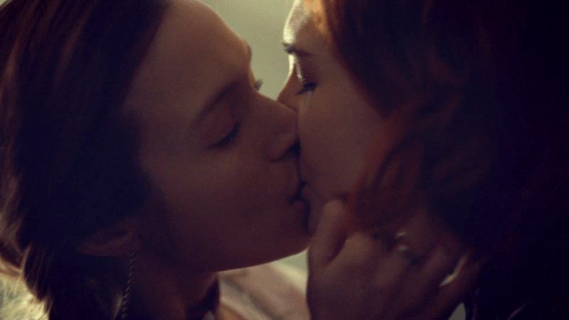 Waverly and Nicole kiss, a close up