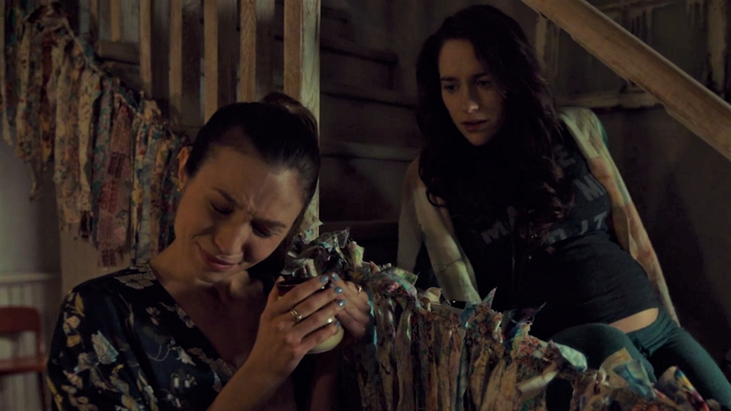 Wynonan looks on worriedly as Waverly cries suddenly