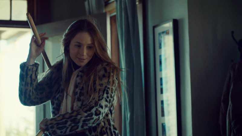 Waverly smirks as she waves her sticks around