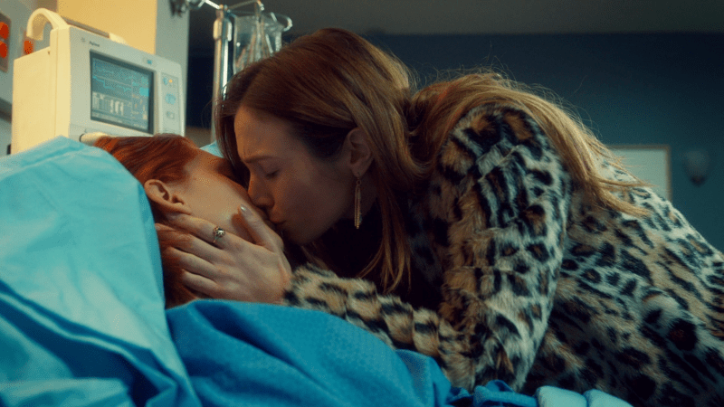 Waverly kisses Nicole as she drifts off