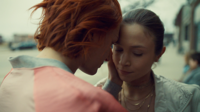 Nicole holds Waverly's face