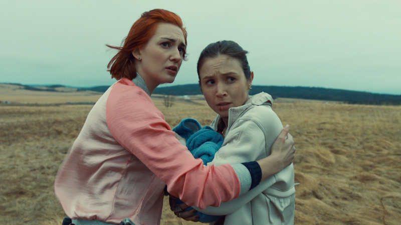 Nicole has her arm around Waverly to protect her and the baby