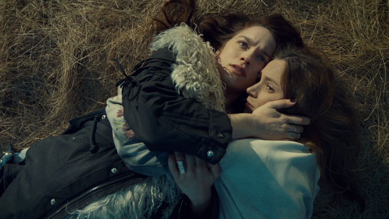 Wynonna holds Waverly close to her, still on the ground