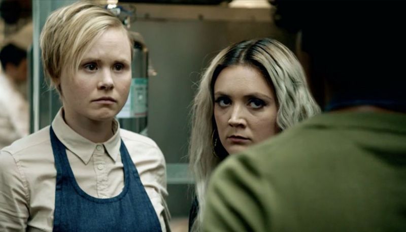 Allison Pill as Ivy in American Horror Story: Cult. With a teenage female character in a kitchen.