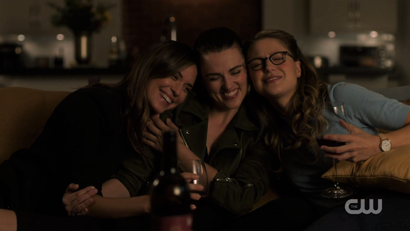 Sam, Lena and Kara snuggle on the couch