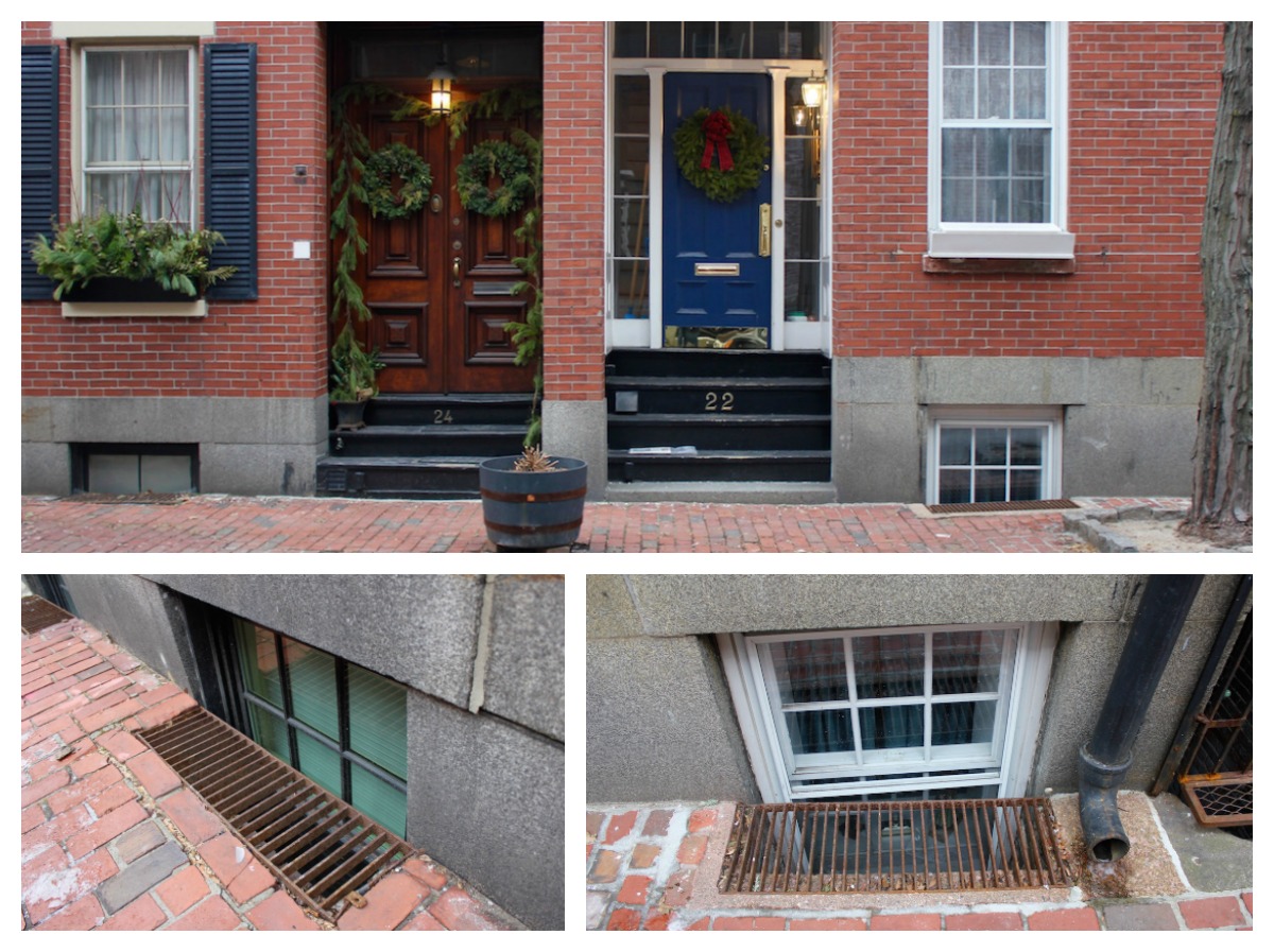 Brick house, windows below street level.