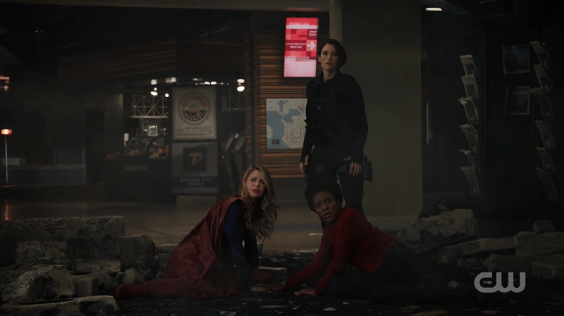 Alex, Supergirl and Julia look at Reign