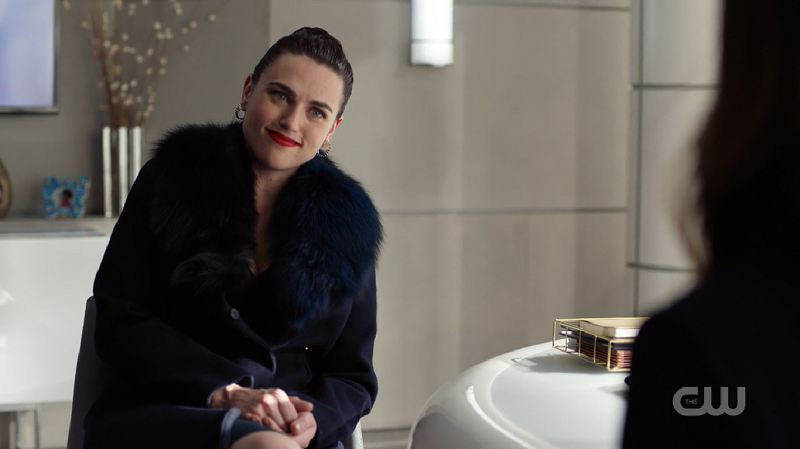 Lena smiles at Sam and it's a doozy