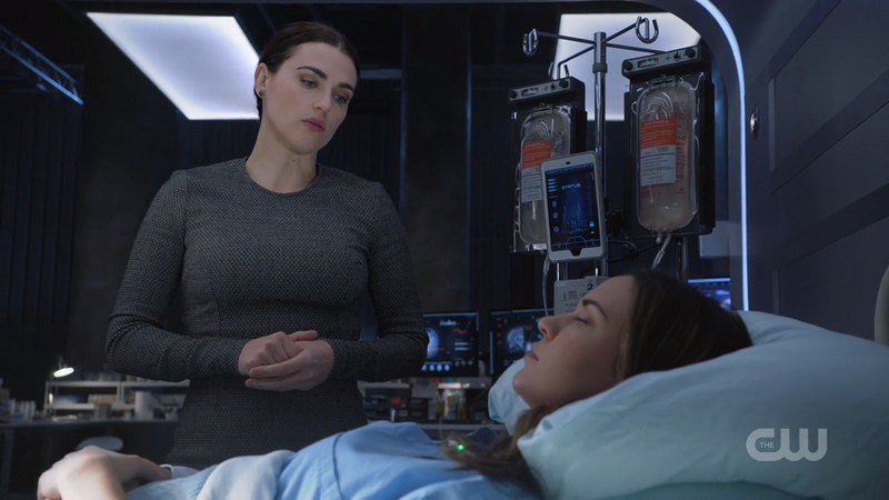 Lena looks over Sam in her hospital bed