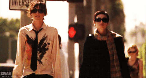 Shane and Jenny walking down the street like a couple of badasses after Jenny's haircut.