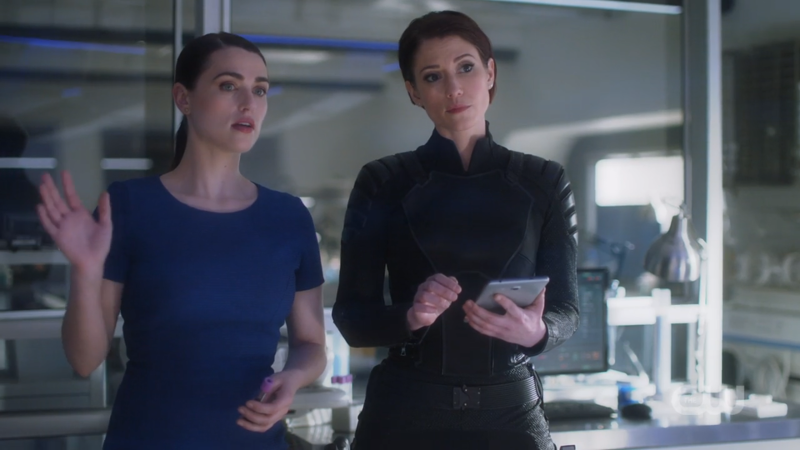 Alex and Lena stand side by side and they just look so good and smart and pretty and gay