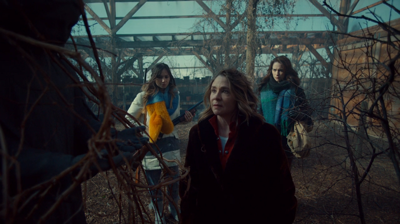 Waverly and Wynonna watch while Michelle fondles an angel statue