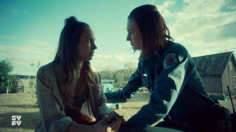 Waverly and Nicole look at each otehr intensely