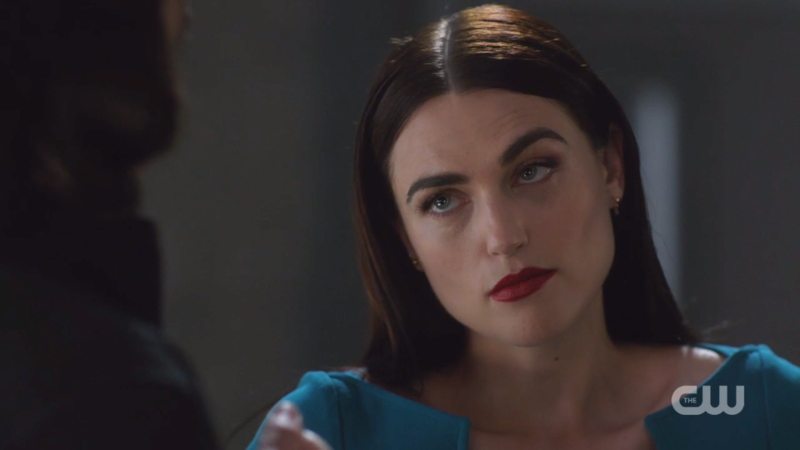 Lena cocks an eyebrow at Brainy