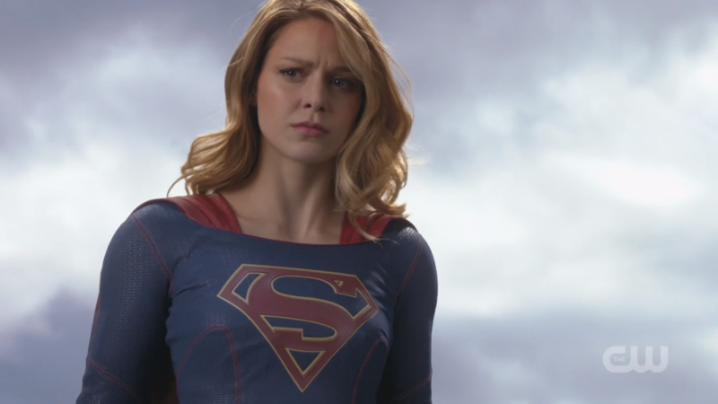 Supergirl hovers over the riot