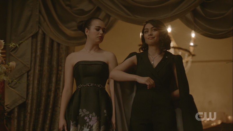 Penelope offers her arm to Josie