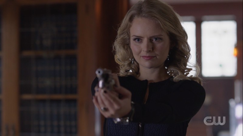 Eve points a gun at Lena