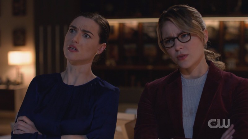 Lena and Kara look confusedly at the murderboard