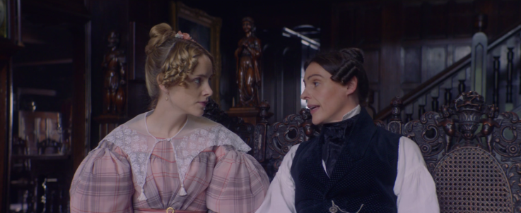 Anne Lister maintaining eye contact with Miss Walker as she says the word 'sex' in front of their families