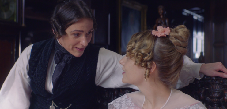 Anne Lister perched on the arm of Miss Walker's seat