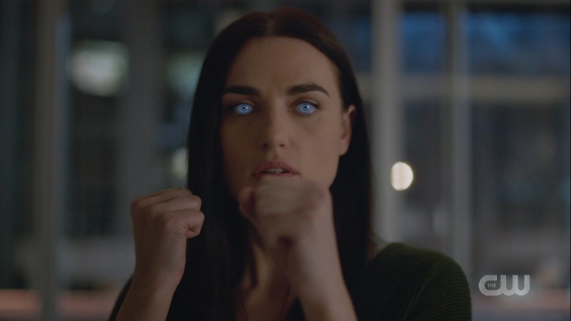 Lena has her white eyeball VR contacts in and her fists up