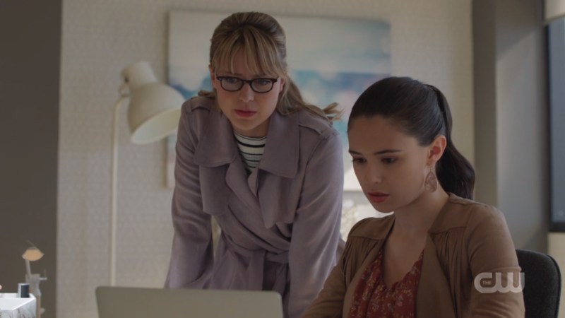 kara and nia look at a laptop