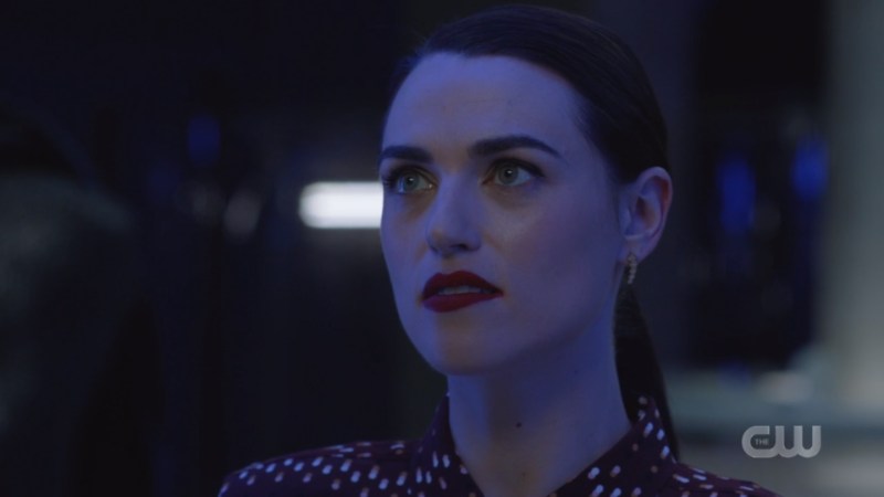 lena looks darkly into the cell