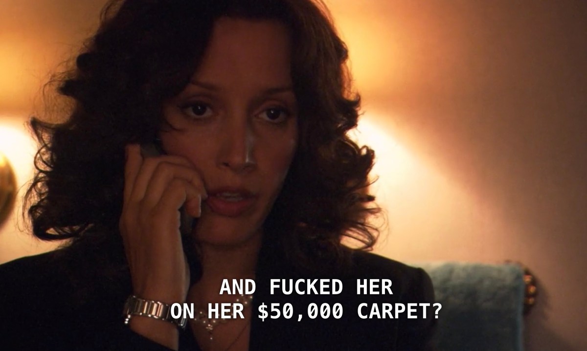 Bette is talking to Tina on her cell phone in Senator Grisham's bathroom to tell her about the sexual tension that is ensuing. Bette asks rhetorically, "So it would be fine with you if I went back in there and fucked her on her 50,000 dollar carpet?" Bette looks confused and annoyed.