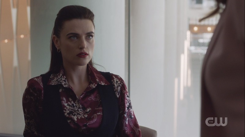 Lena considers her mother carefully while sitting fiercely