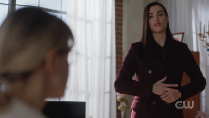 Lena wrings her hand nervously