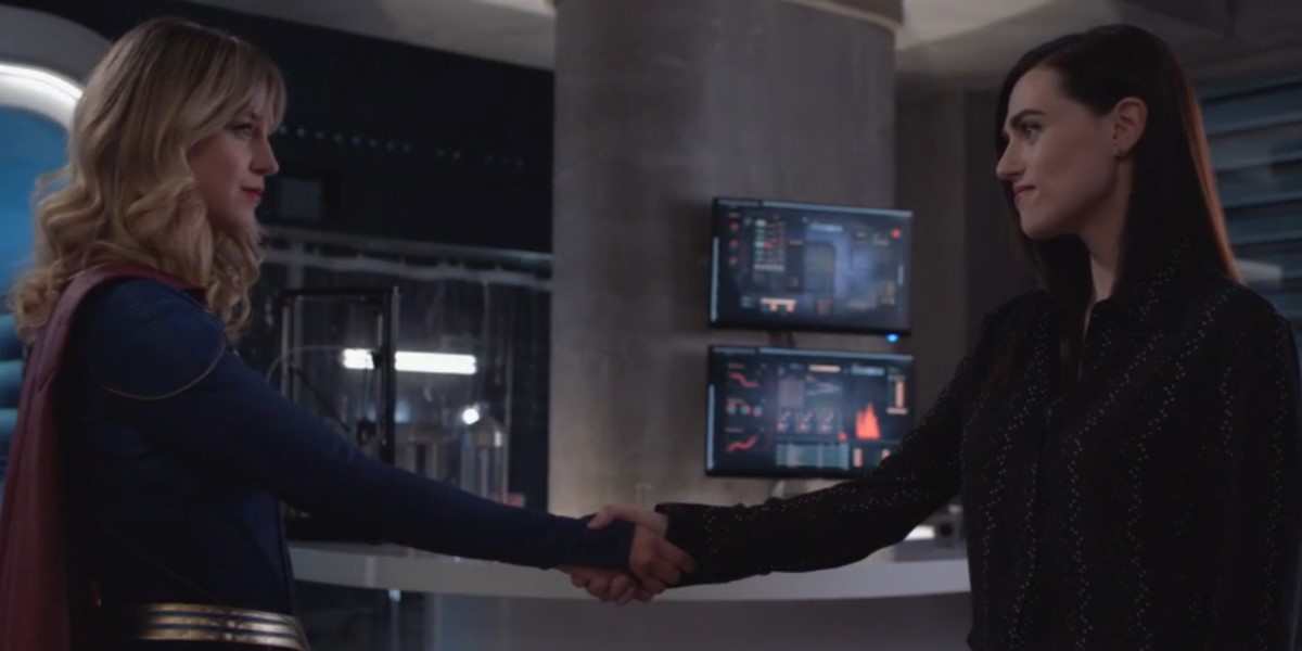 kara and lena shake hands