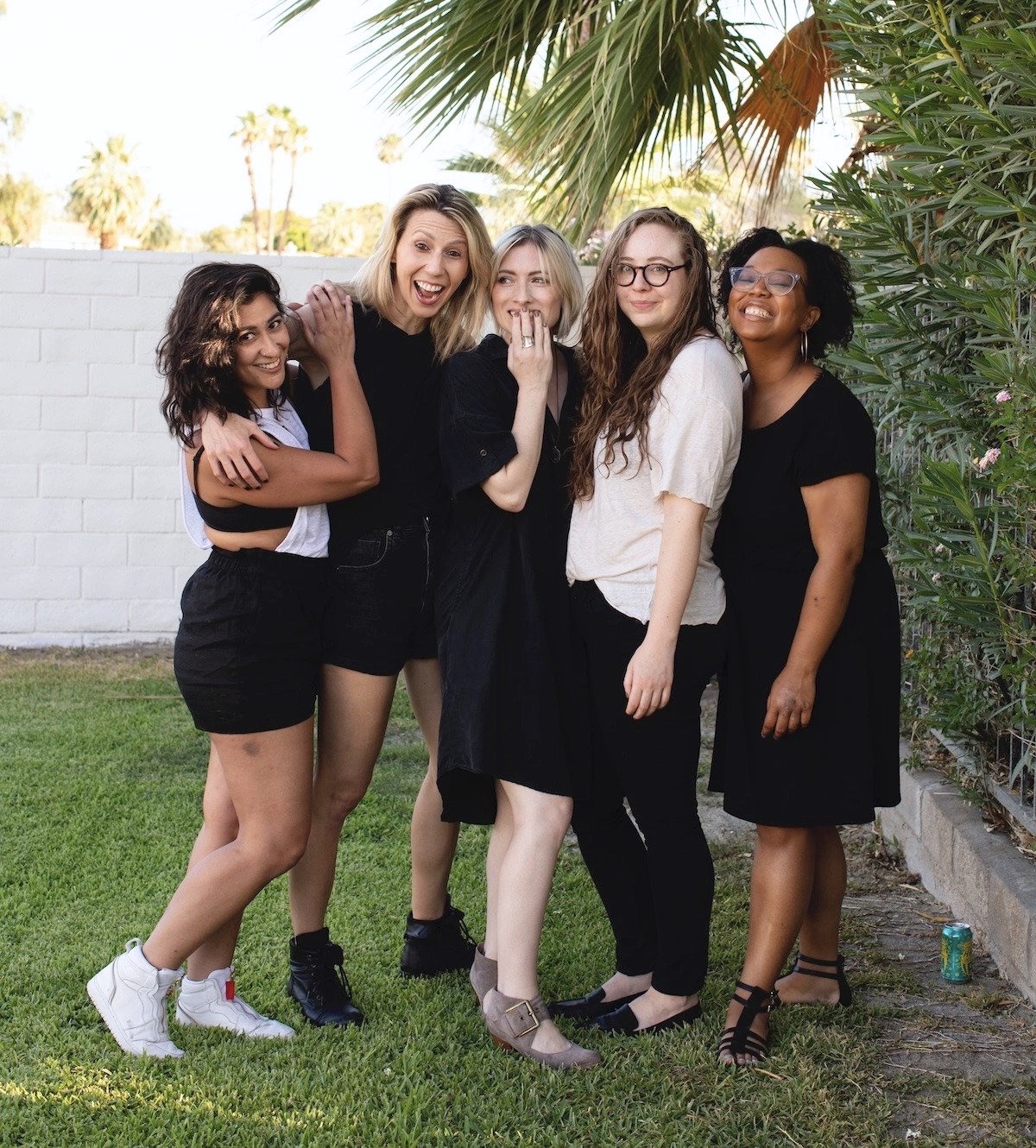 A photo of: Sarah, Riese, Laneia, Rachel, and Carmen standing in the sunlight.